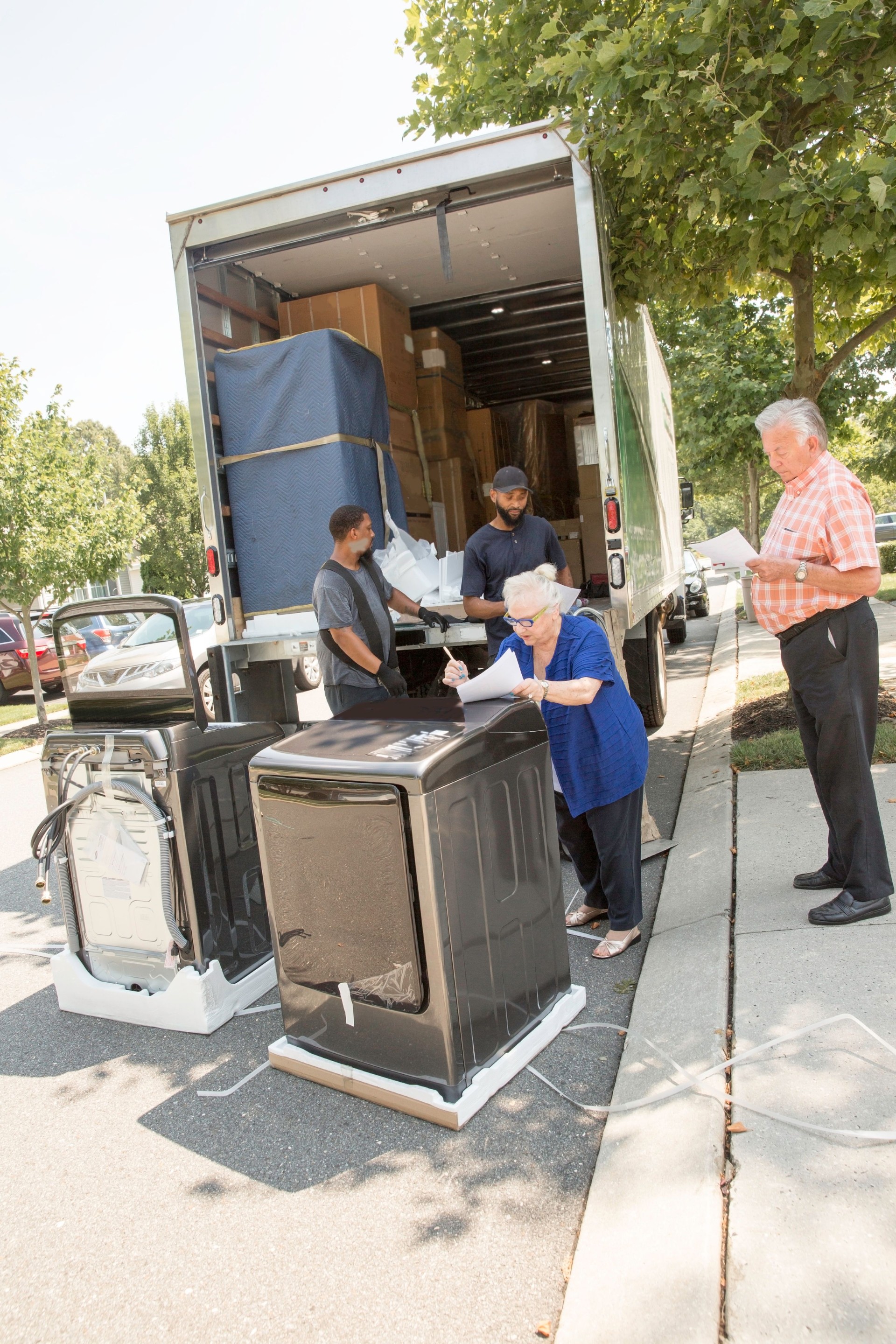 Real Situation-Senior couple receives delivery of new appliances